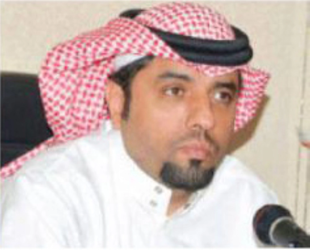 سعود الرومي (يمين)