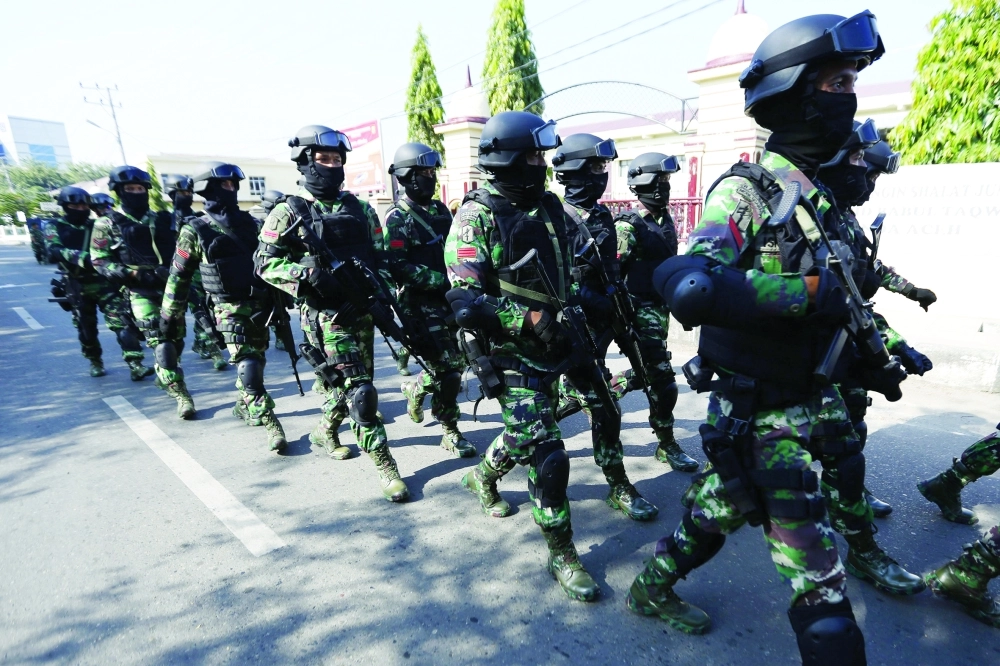 فرقة إندونيسية لمكافحة الإرهاب خلال تمرين في باندا اتشيه                    (إ ب أ)