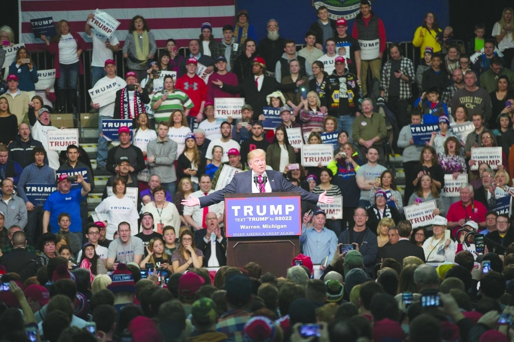 ترامب في تجمع انتخابي لأنصاره في ميتشجان                                    (أ ف ب)