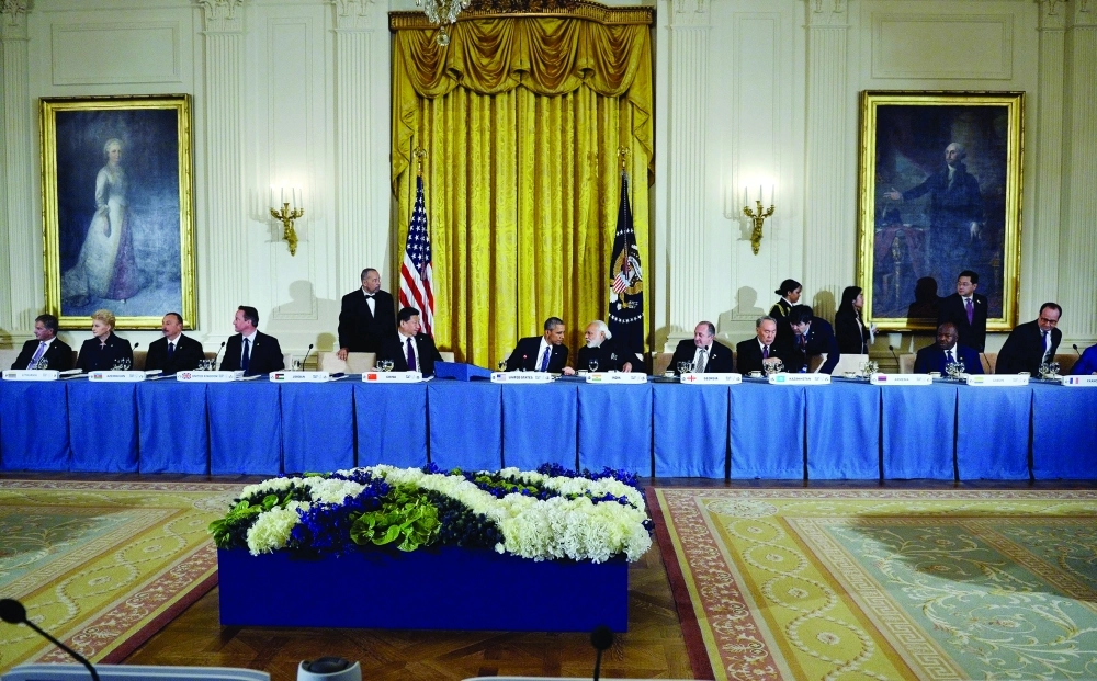 أوباما وعدد من قادة العالم في قمة النووي بواشنطن أمس                      (أ ف ب)