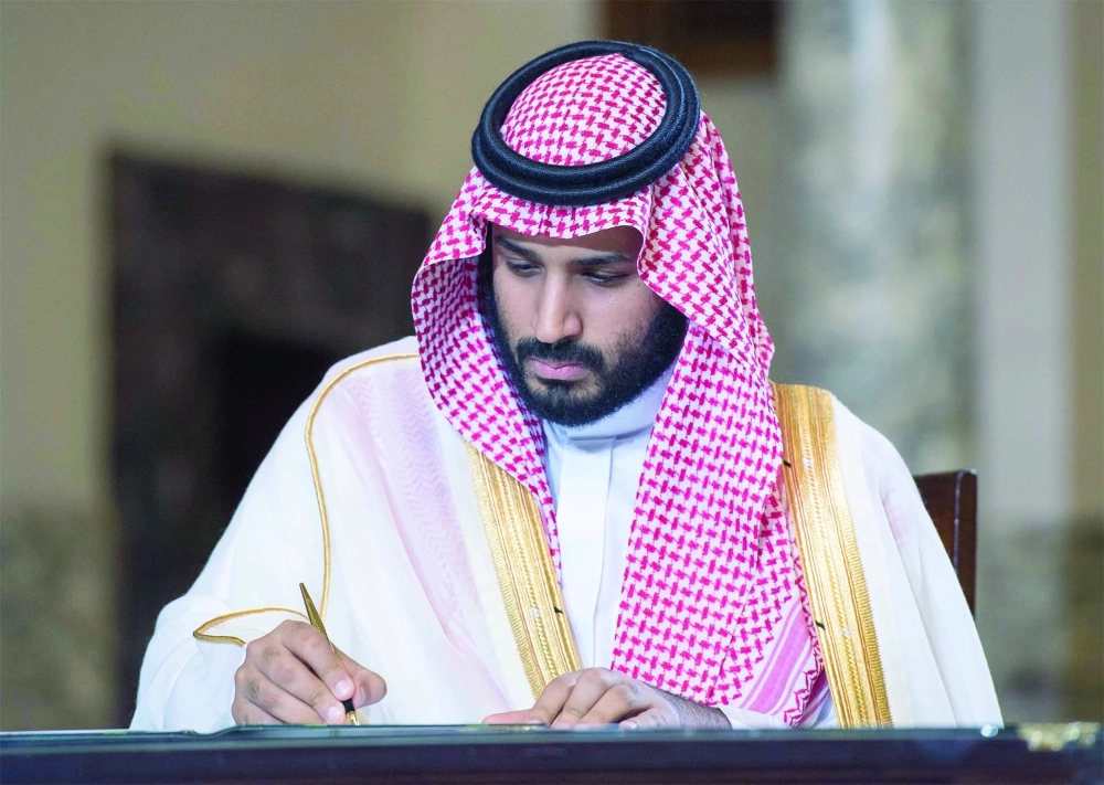 ولي ولي العهد خلال توقيع احدى الاتفاقيات