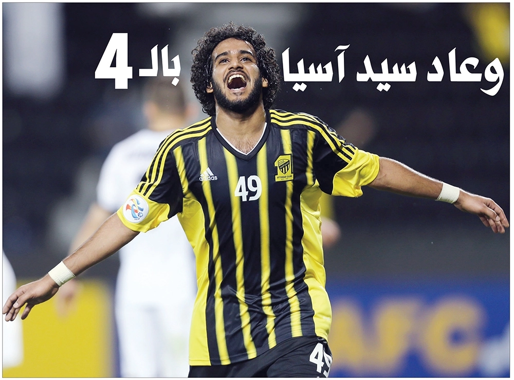 
    مهاجم الاتحاد عبدالرحمن الغامدي محتفلا بهدفه الثاني في سباهان أمس في دوري أبطال آسيا (أ ف ب)