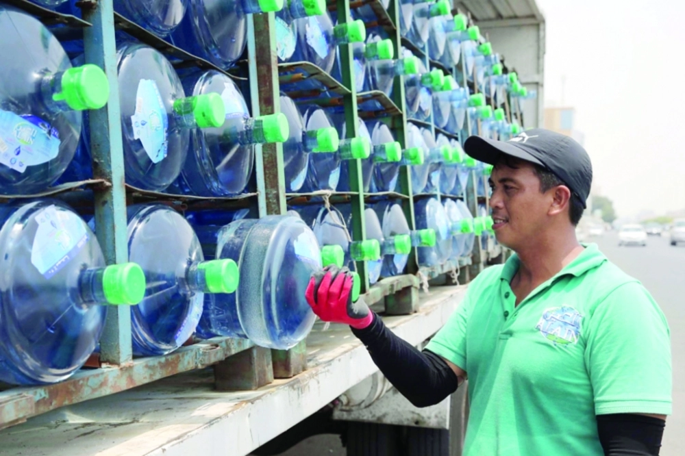 عامل توصيل عبوات المياه الصحية للمنازل                 (مكة)