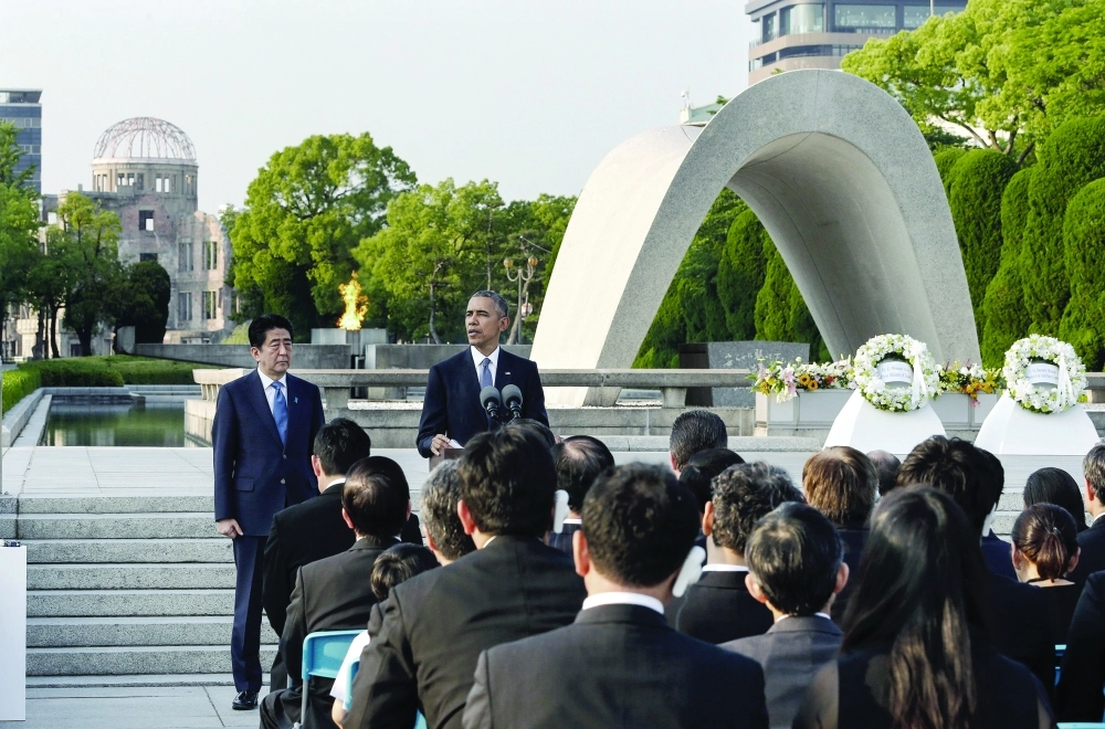 أوباما يتحدث بجانب آبي في هيروشيما اليابانية                                     (أ ف ب)