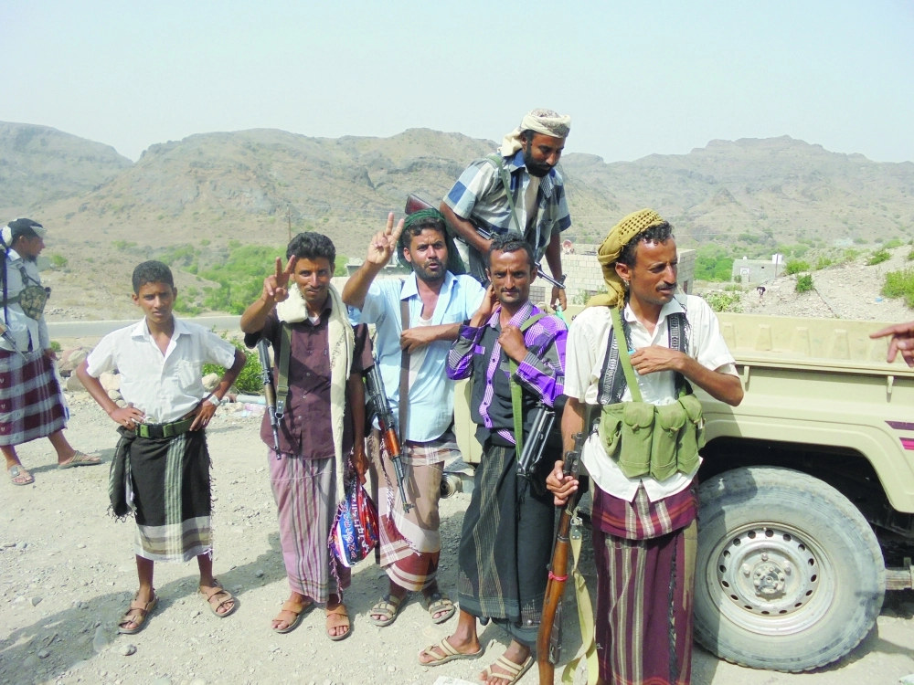 عناصر من المقاومة الشعبية في جبهة كرش بمحافظة لحج                                                 (أديب محمد)