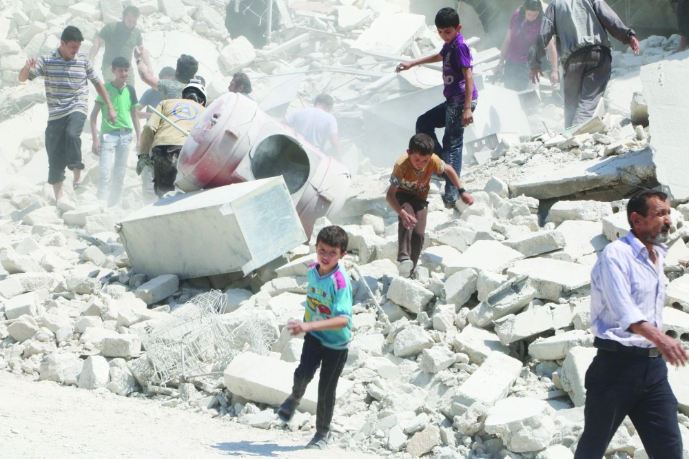 أنقاض مبان دمرتها غارة على حي المرجة بحلب                                                             (رويترز)