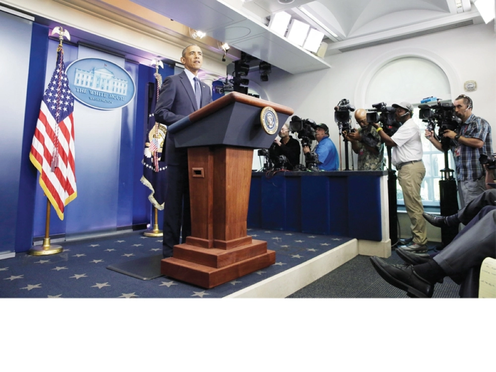 أوباما يتحدث في البيت الأبيض عن مجزرة أورلاندو      (أ ف ب)