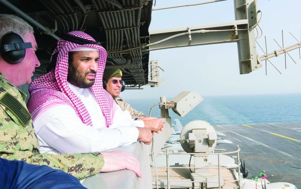 الأمير محمد بن سلمان في زيارة سابقة لحاملة الطائرات الأمريكية ثيودور روزفلت          (مكة)