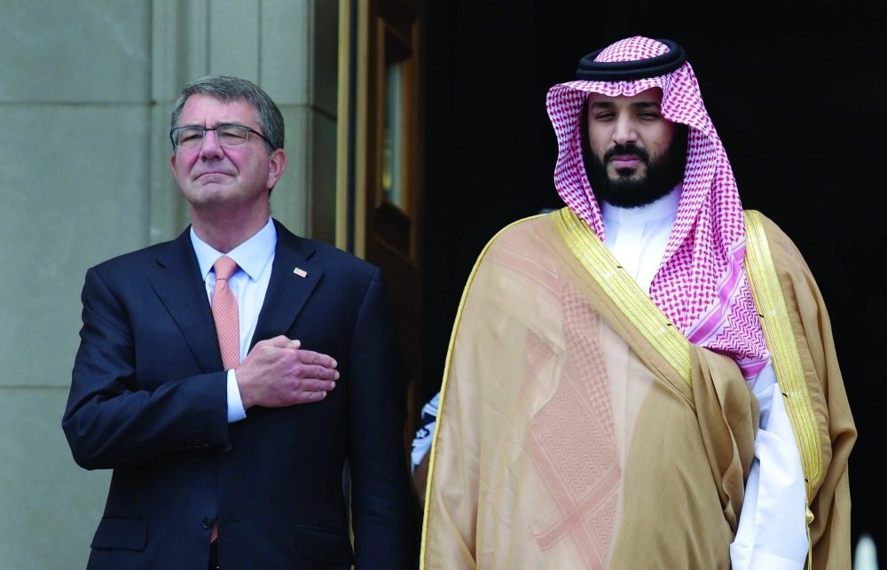 ولي ولي العهد وآشتون كارتر خلال زيارته البنتاجون  (رويترز )