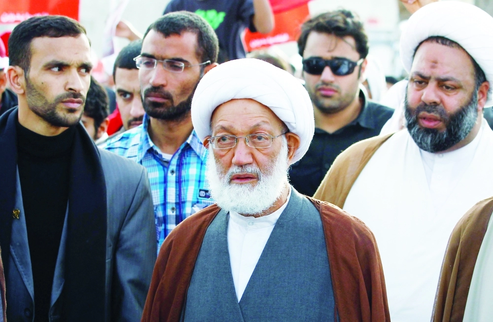 قاسم خلال مسيرة بمارس الماضي (رويترز) 