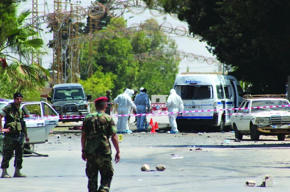 قوات لبنانية قرب مكان التفجير في القاع          (أ ف ب)