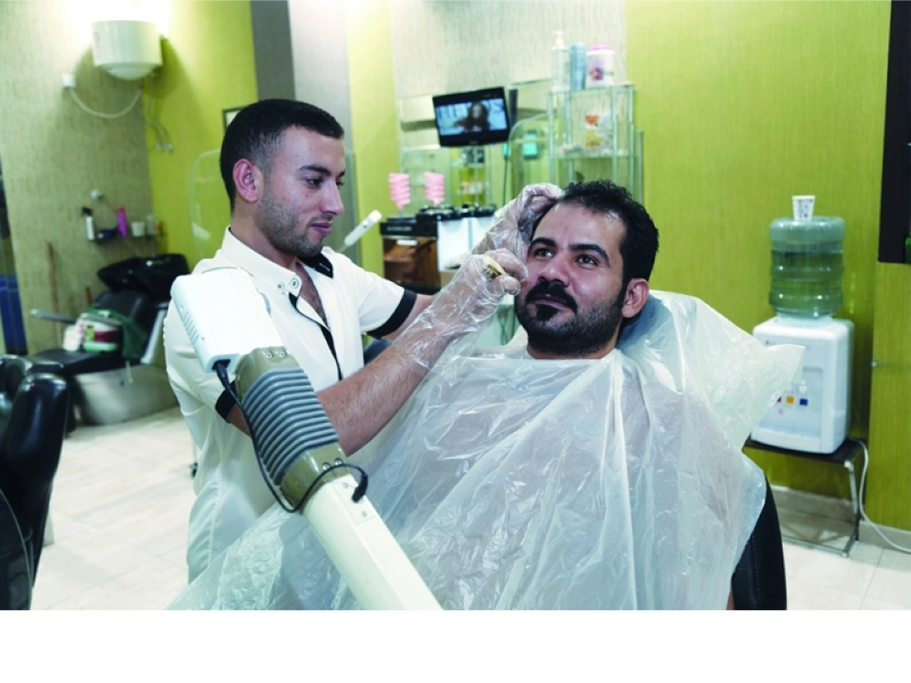 أحد صالونات الحلاقة في المدينة (محمد عبداللطيف)