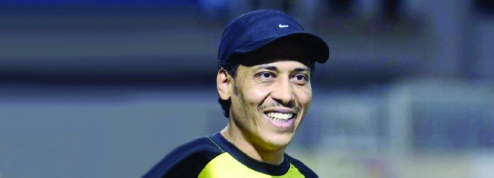 عبدالله فوال    (يمين)