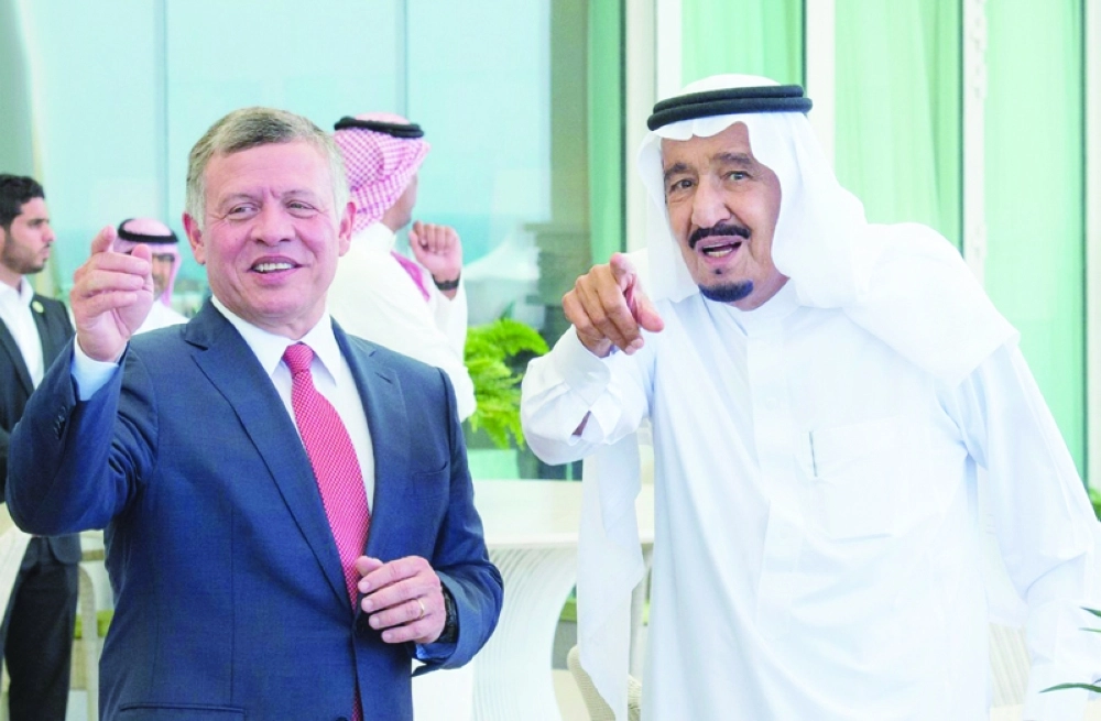 خادم الحرمين خلال استقباله عبدالله الثاني (واس)