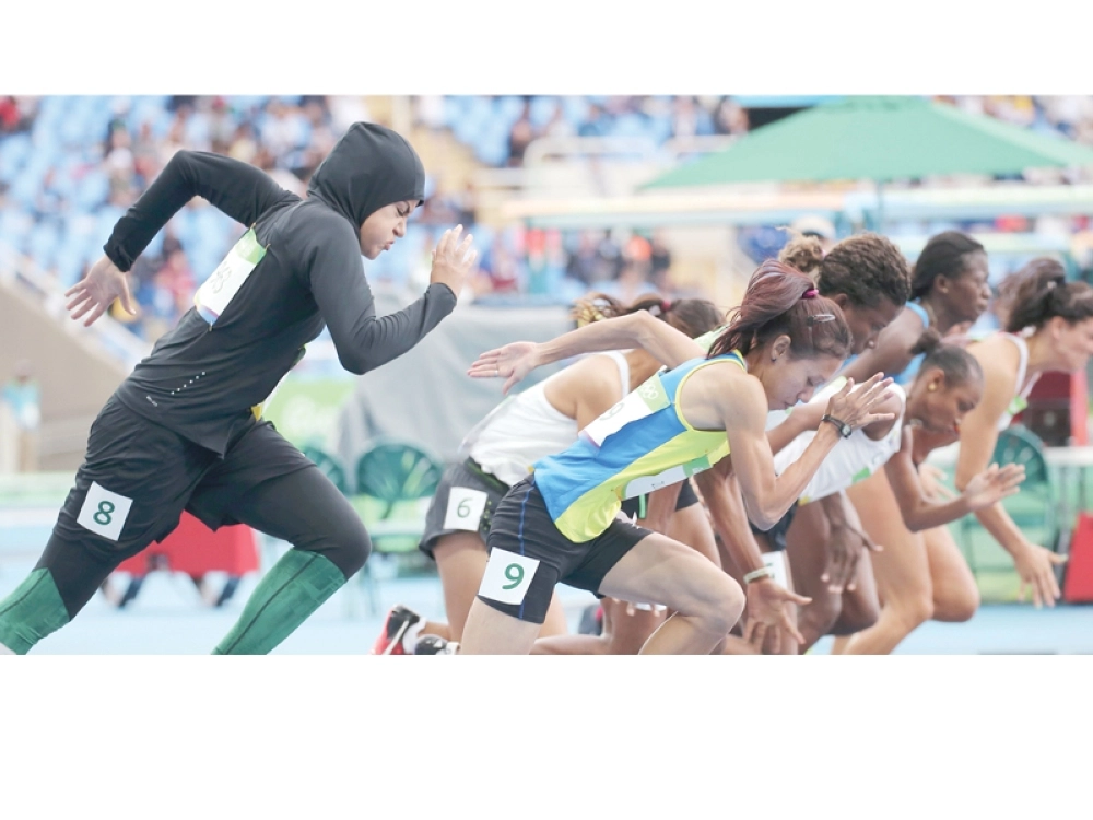 كاريمان أبو الجدايل خلال مشاركتها في سباق 100م               (رويترز)