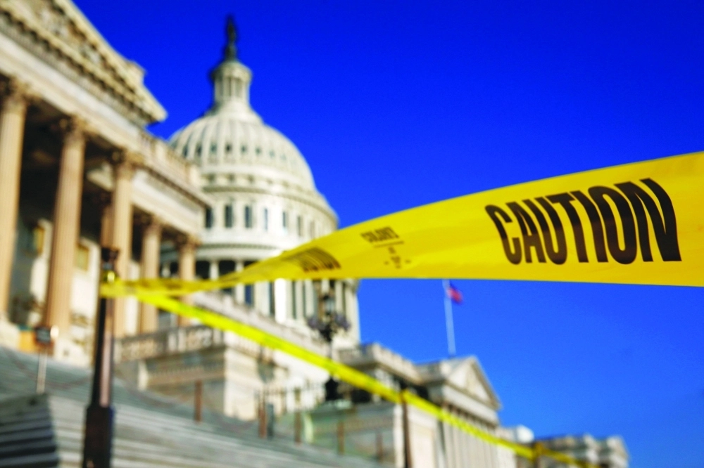 حذار، شريط تنبيه يحيط بمنطقة تحت الإنشاء في الكونجرس الأمريكي                  (رويترز)