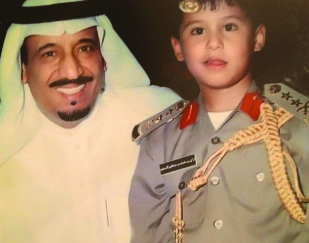 الملك سلمان ونجله الأمير تركي