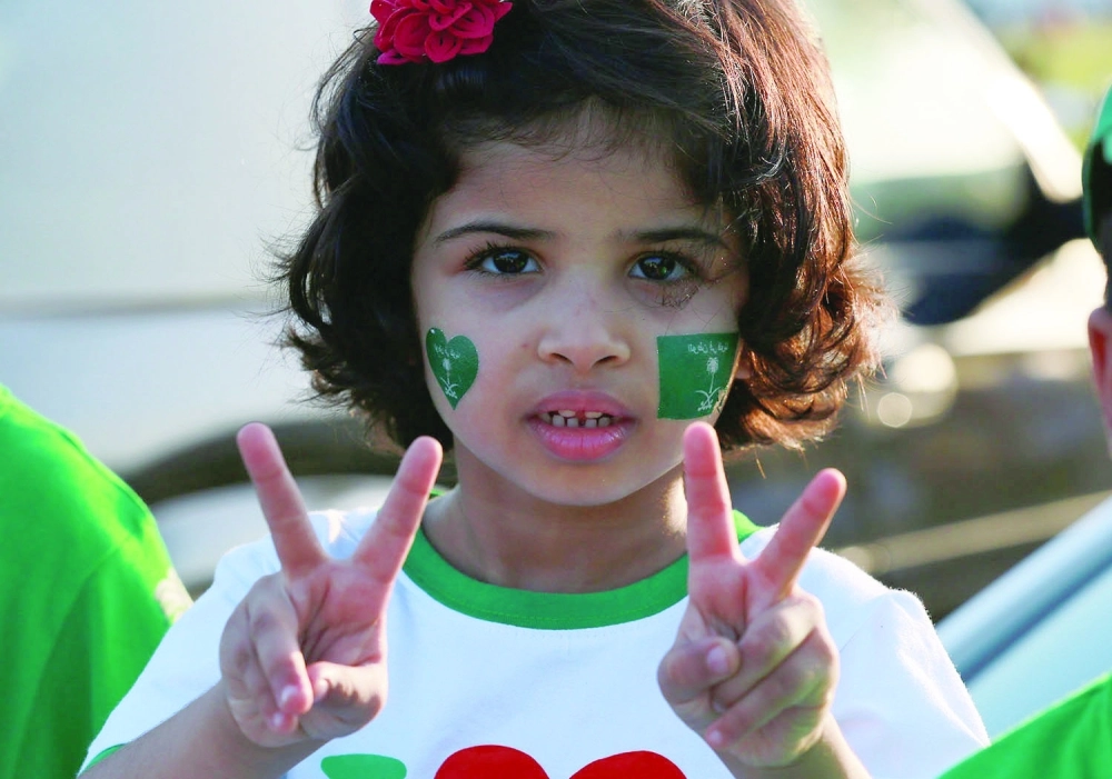 طفلة تحتفي باليوم الوطني (حمدان الدوسري)