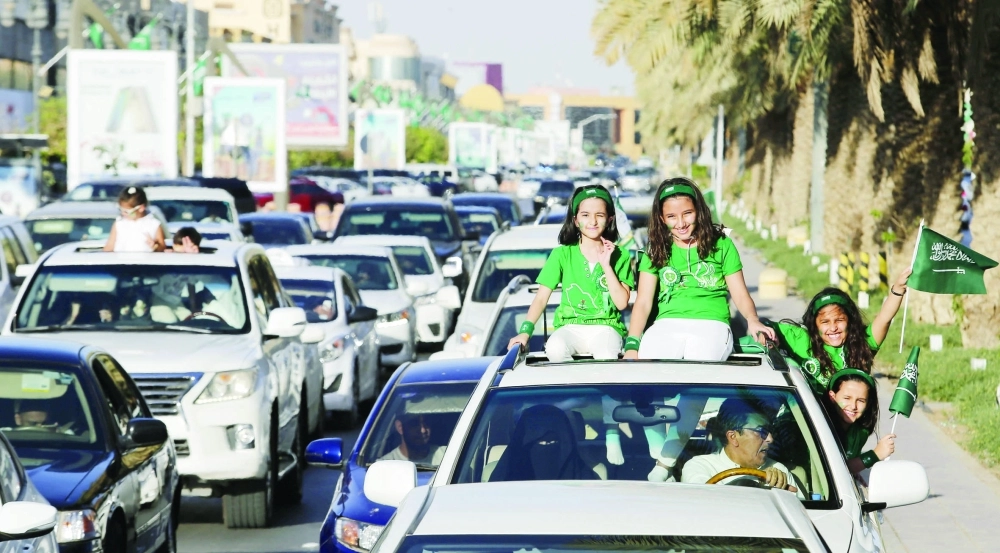 مسيرة احتفالية باليوم الوطني في الرياض أمس (محمد مشهور)