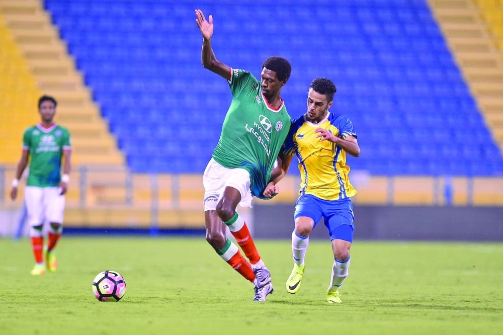 محمد كنو خلال قيادته الاتفاق أمام الغرافة (مكة)