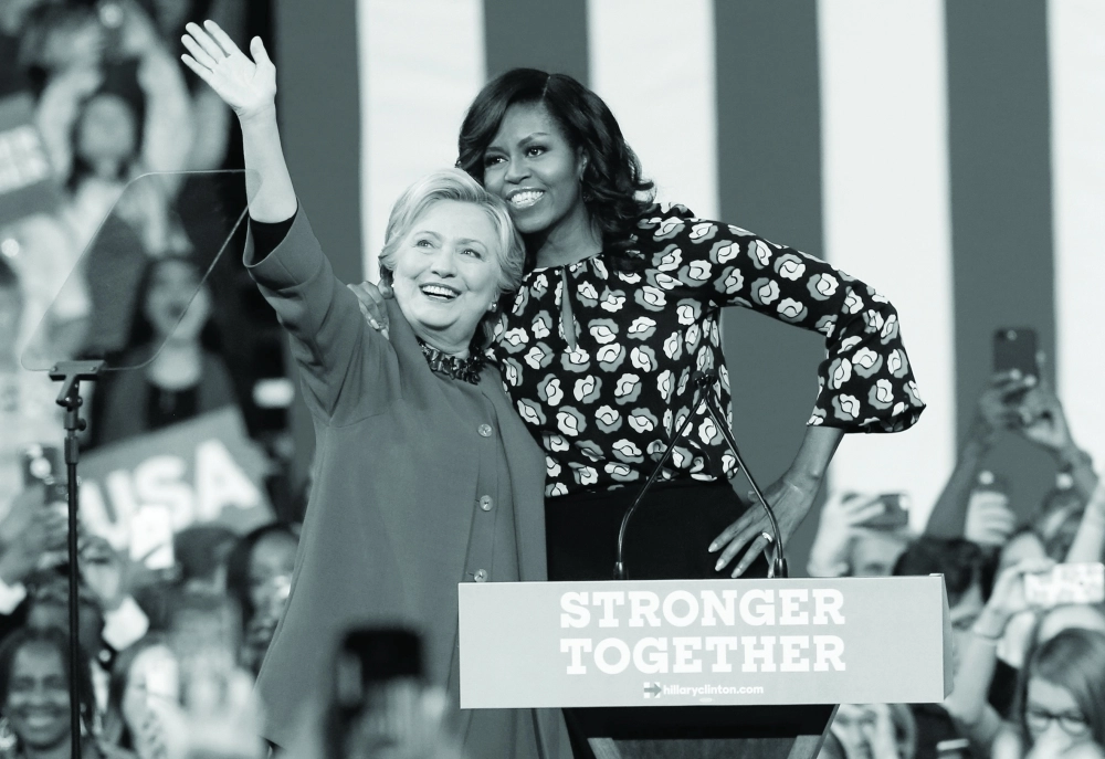 كلينتون وميشيل في حملة انتخابية بشمال كارولينا                                             (إ ب أ)