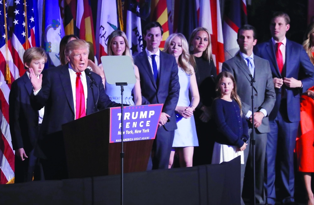 ترامب وأسرته بعد إعلان فوزه بالانتخابات الأمريكية (أ ب)