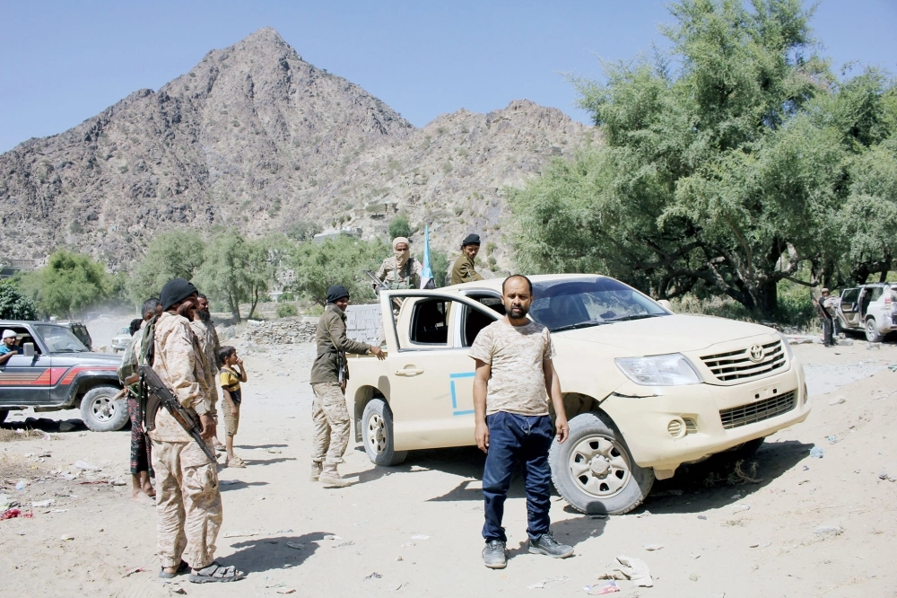 مقاتلون من الجيش الوطني قرب البيضاء    (أديب محمد)