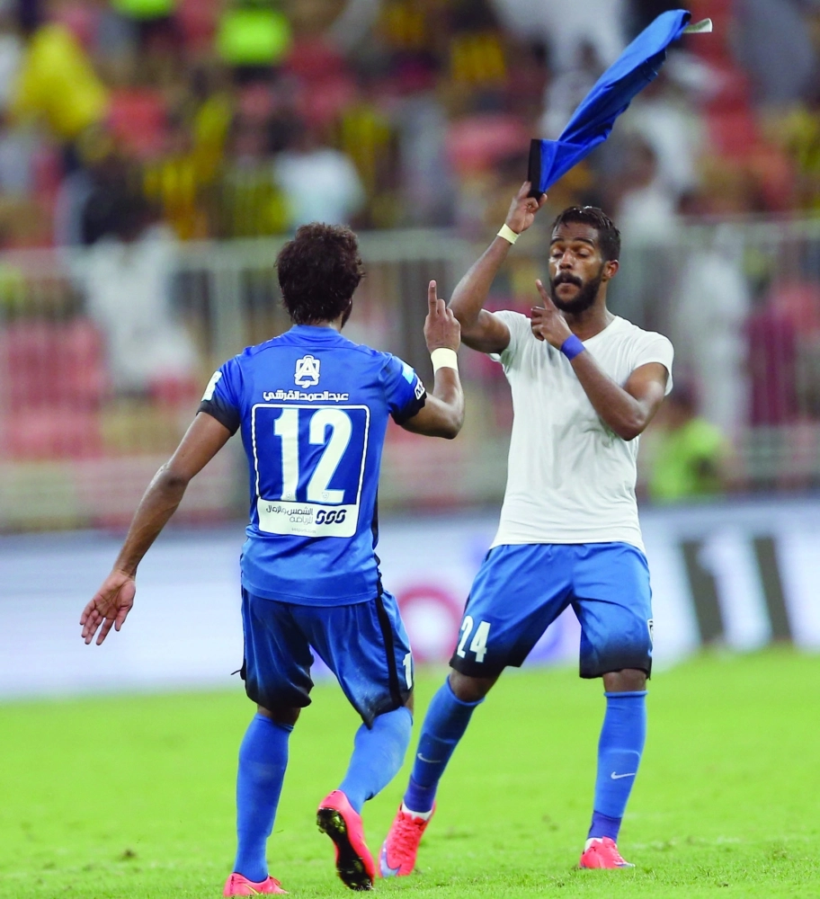 نواف العابد يحتفل مع ياسر الشهراني                 (مكة)