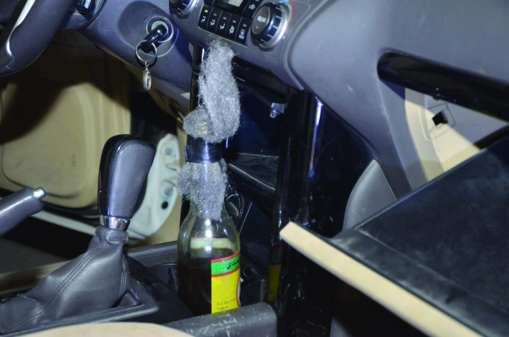 زجاجة المولوتوف في مركبة الجناة                     