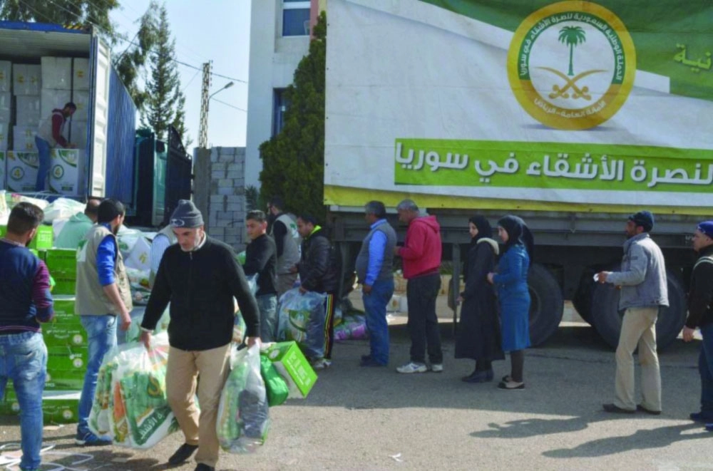 سوريون بلبنان يتلقون مساعدات سعودية                                           (واس)