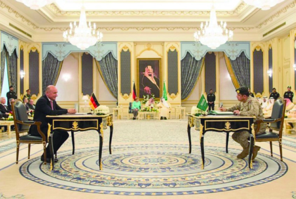 خادم الحرمين وميركل يشهدان توقيع الاتفاقيات