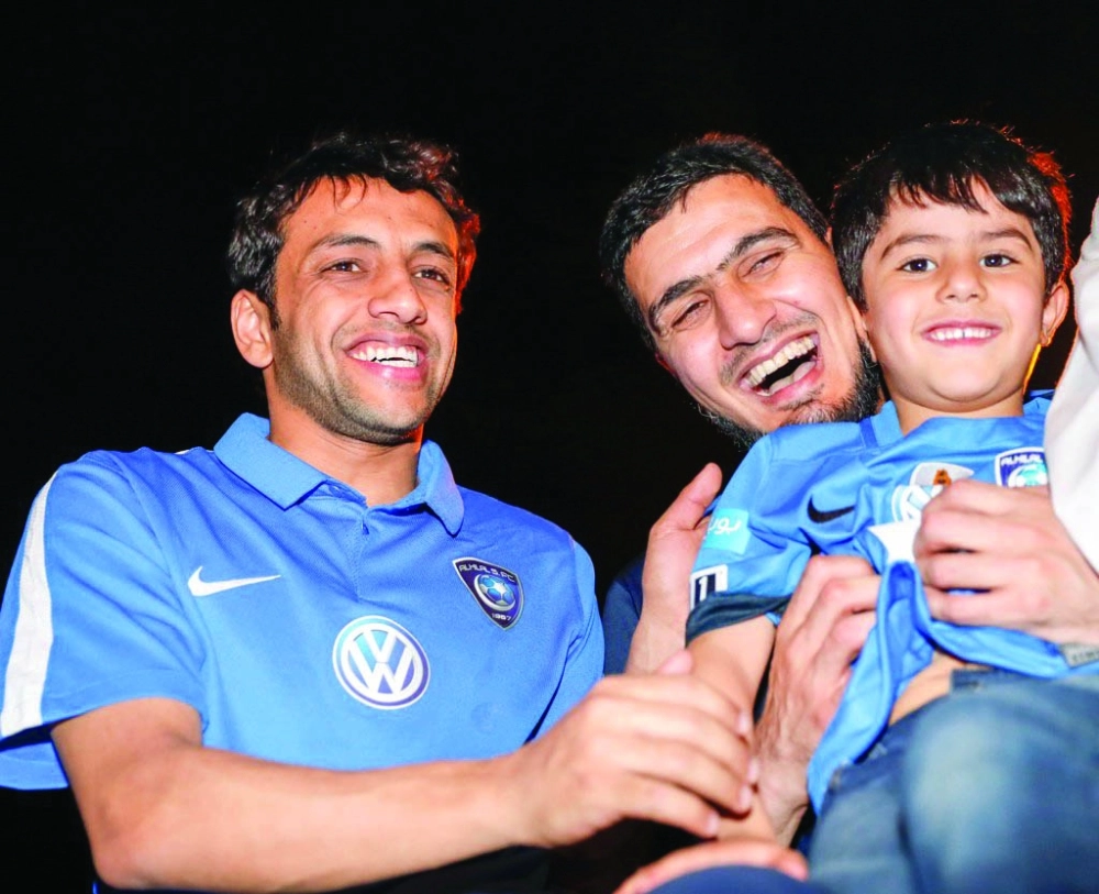 المفرج مع ابنه الصغير والشلهوب