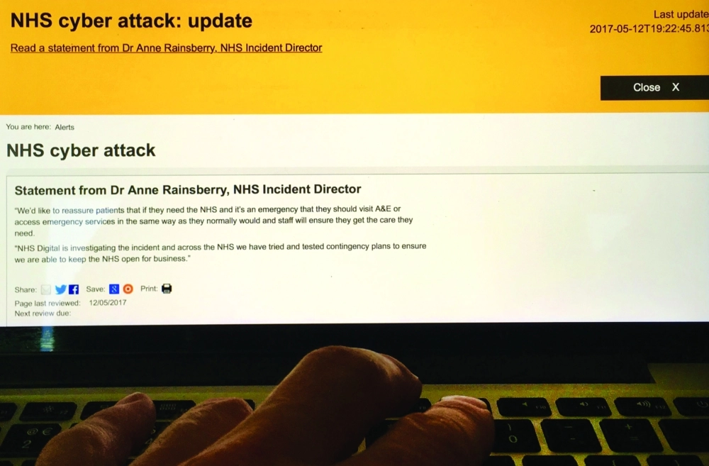 الفيروس على موقع الخدمة الصحية  البريطاني                  (إ ب أ)