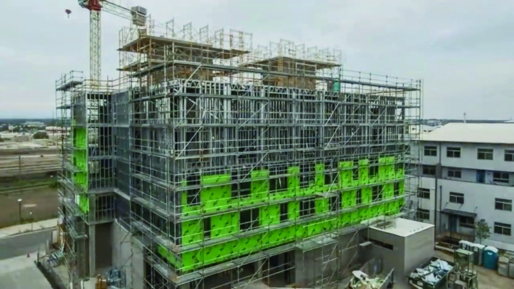 بناء متعدد الأدوار بالتقنيات الحديثة