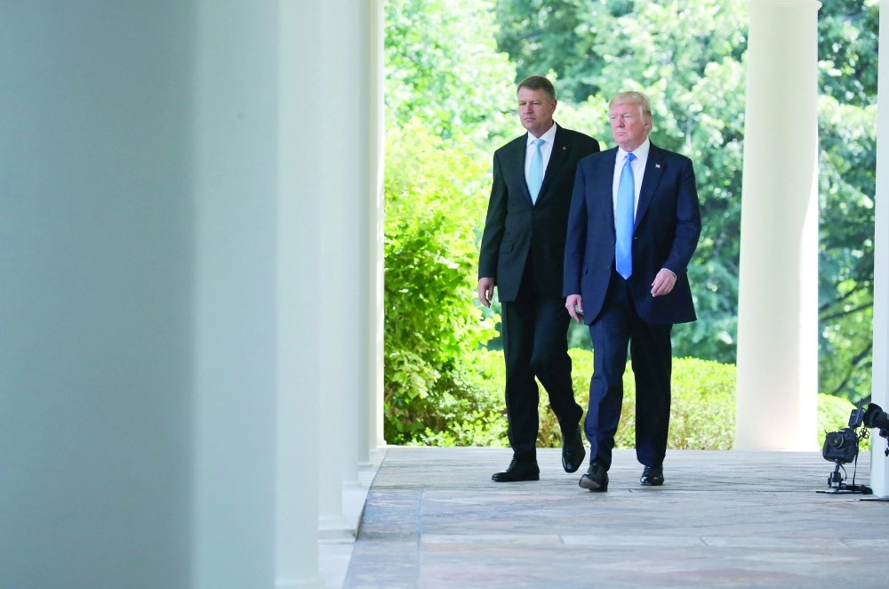 ترمب في طريقه لمؤتمر صحفي مع يوهانيس بواشنطن                   (رويترز) 