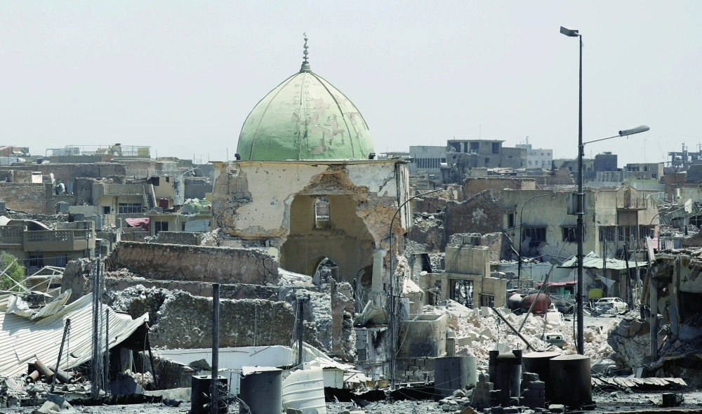 جامع النوري الكبير بعد تدمير قبته ومئذنته الحدباء من قبل دواعش الموصل                    (رويترز)
