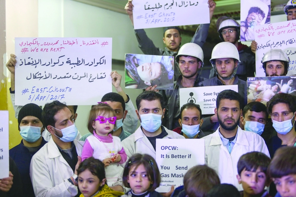 تجمع للتضامن مع ضحايا خان شيخون بدوما في مايو                      (إ ب أ)