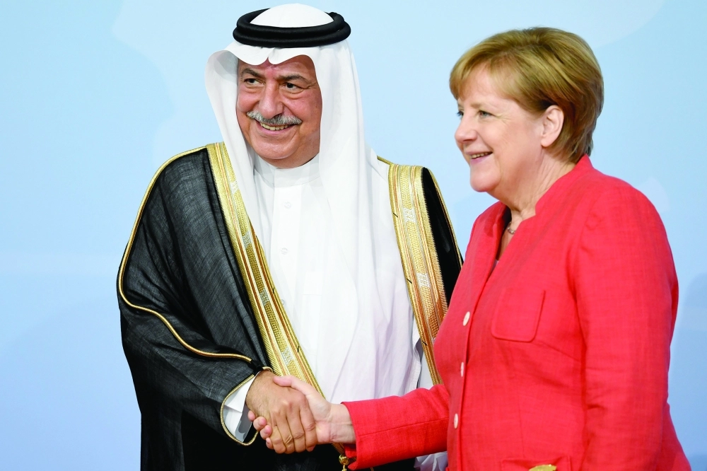  إبراهيم العساف مع أنجيلا ميركل                    (إ ب أ)