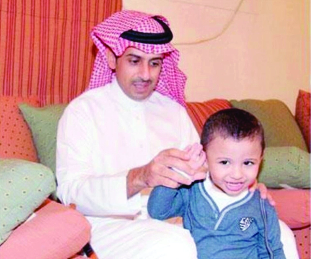  طارق العلاقي وأحد أبنائه