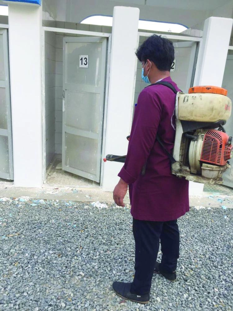 من أعمال الرش والنظافة                 (هيئة تطوير مكة)