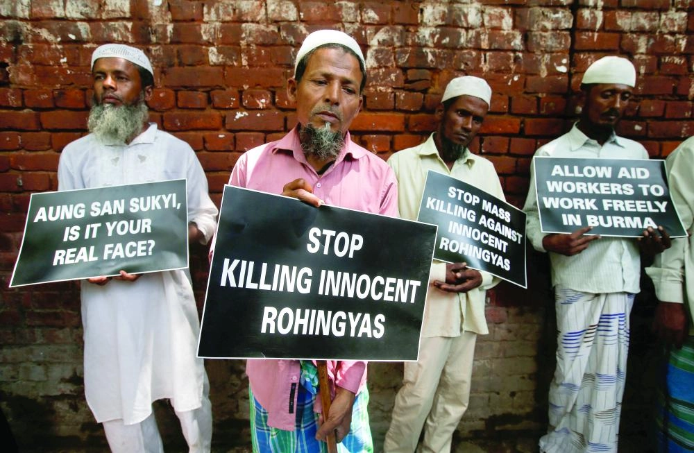 






لاجئون من الروهينجا في مسيرة غضب بنيودلهي أمس                                (رويترز)