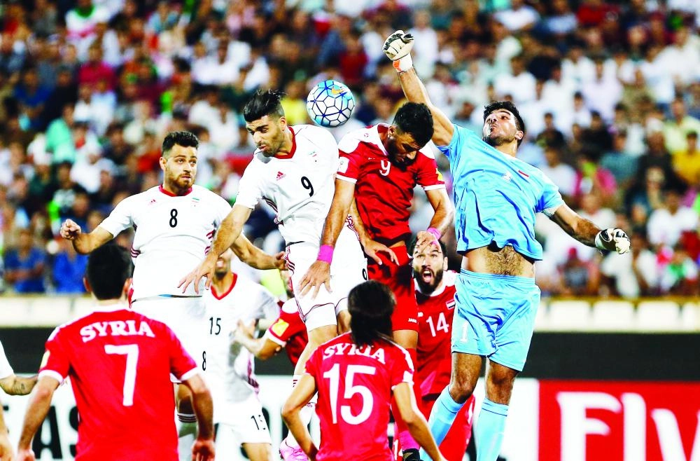 






من مواجهة سوريا وإيران أمس                                                                                                                         (إ ب أ)