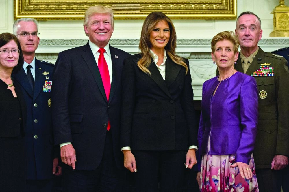 






ترمب وزوجته في حفل عشاء بالبيت الأبيض                                                   (إ ب أ)