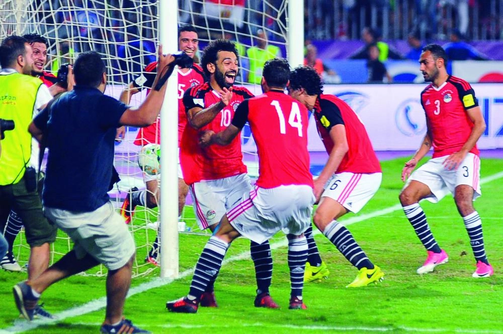 






فرحة لاعبي مصر بالتأهل                           (د ب أ)