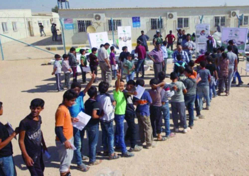 






طلاب سوريون في فناء مدرسة بالزعتري