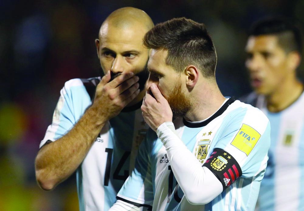 Soccer Football - 2018 World Cup Qualifiers - Ecuador v Argentina - Olimpico Atahualpa stadium, Quito, Ecuador - October 10, 2017. Argentina's Lionel Messi and Javier Mascherano talk as they leave at the end of the first half. REUTERS/Henry Romero