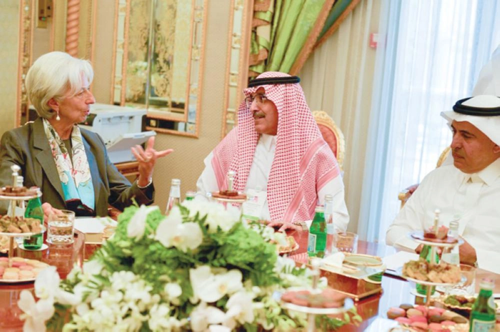 الجدعان خلال لقائه لاجارد                                 (تويتر)