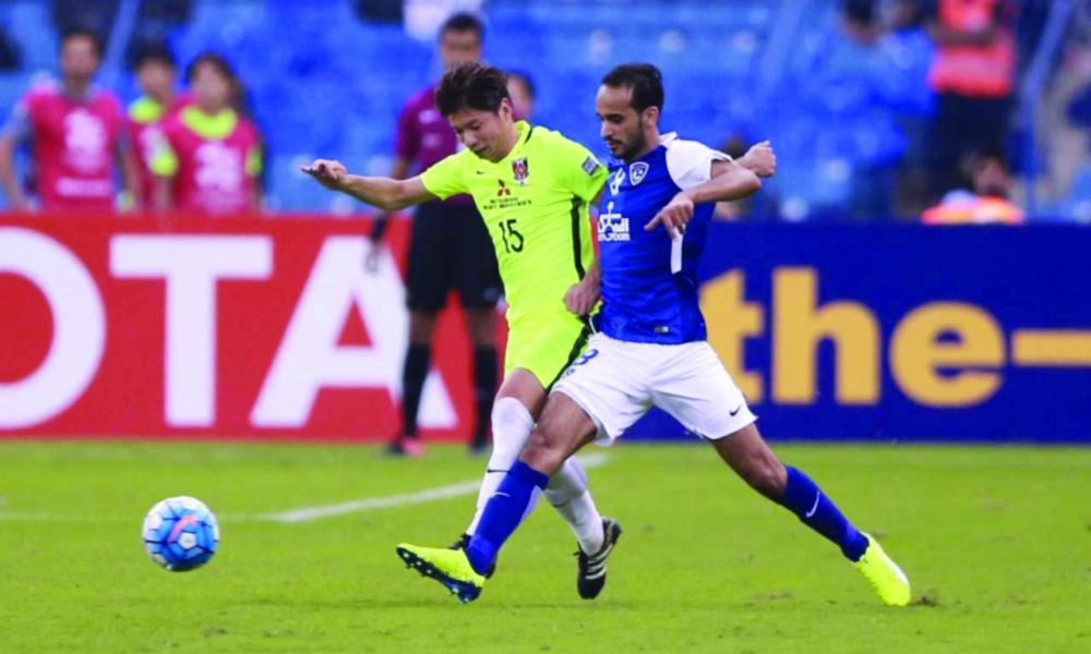 






عبدالله عطيف محاولا إفساد هجمة يابانية                                                                   (ياسر بخش)