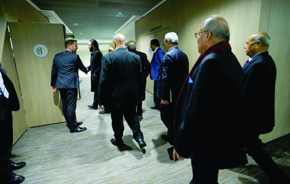 






وفد المعارضة السورية في أروقة جنيف             (رويترز)