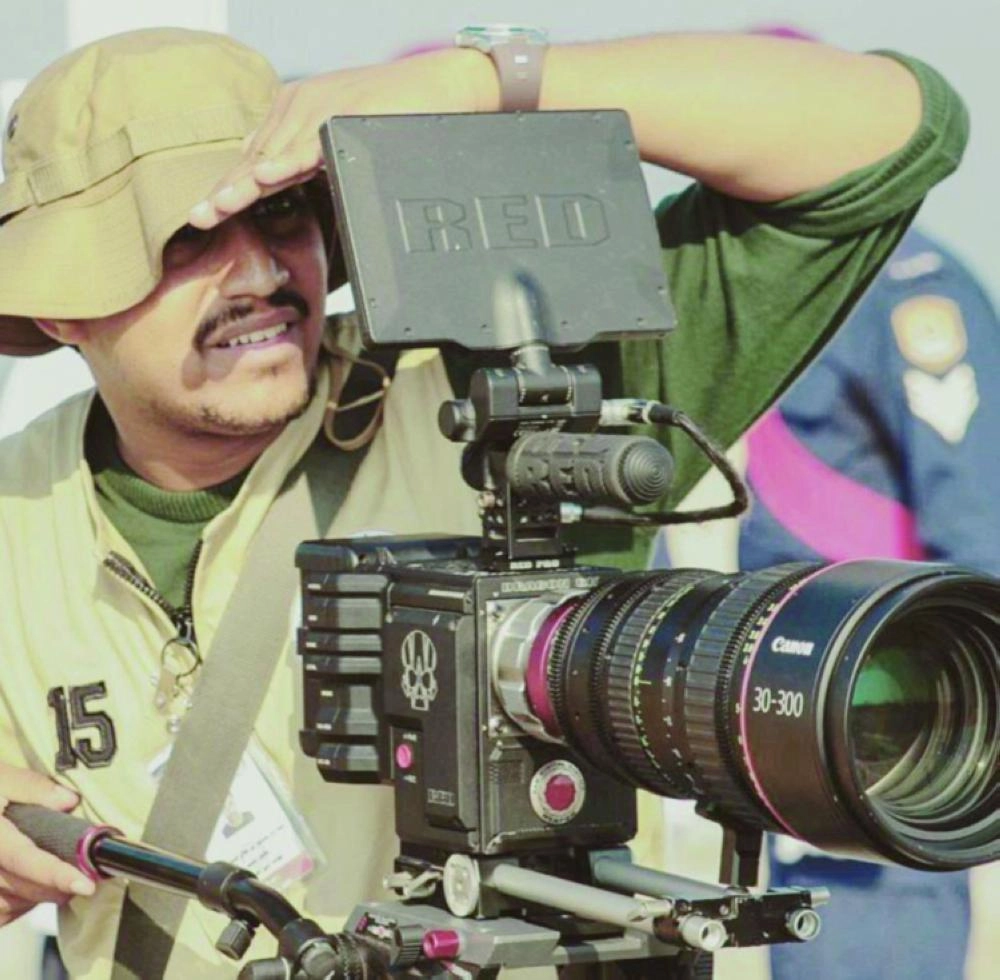 






أحمد السفياني خلال التصوير                       (مكة)